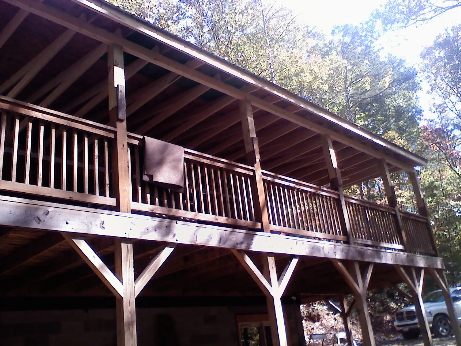Timber framing under a new elevated porch and deck — Roof Leak Repair in Buffalo Grove by Roofing Brothers
